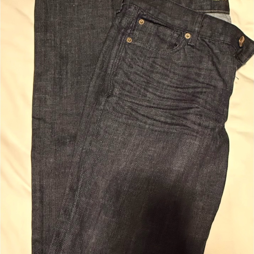 Woman’s dark blue denim Express Mia Cut used but in great condition.